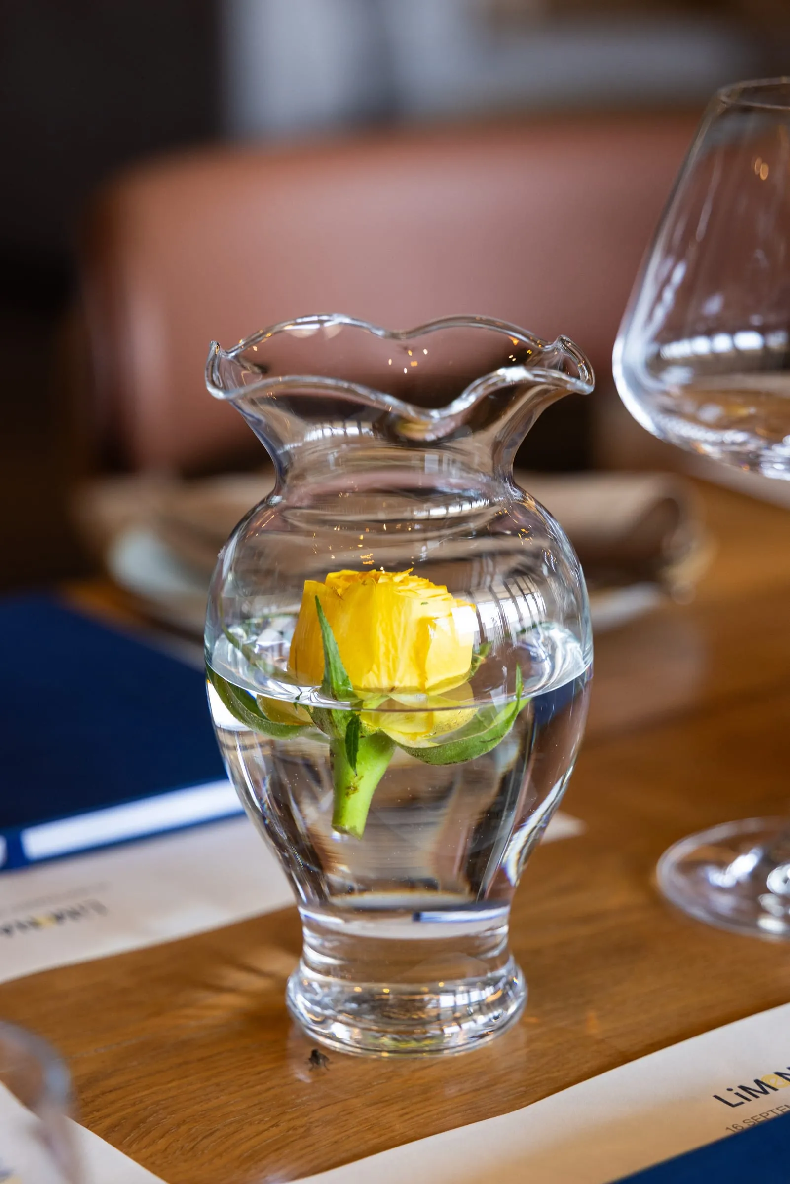 Glassware and fresh flowers on the table