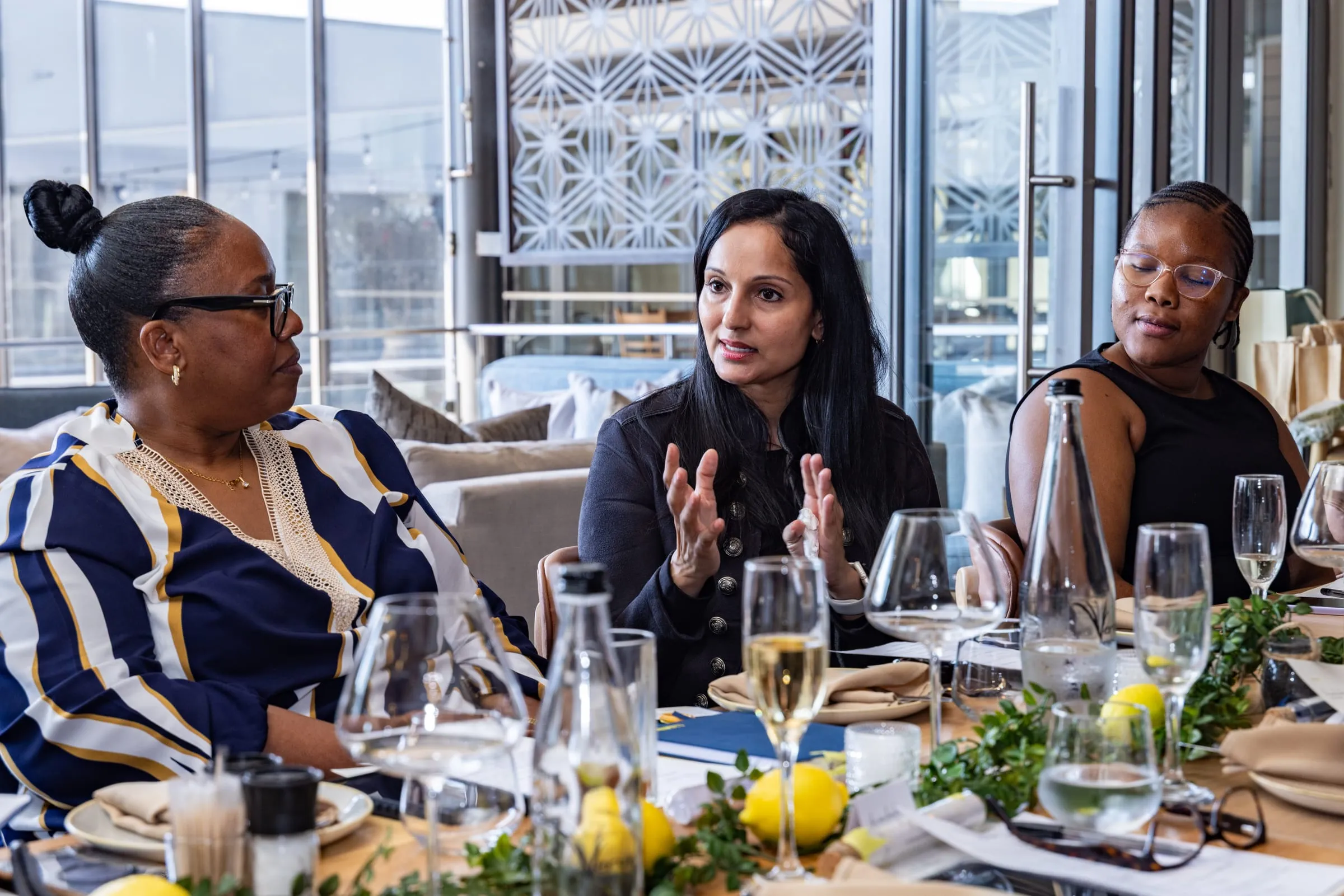 Guests in conversation over lunch