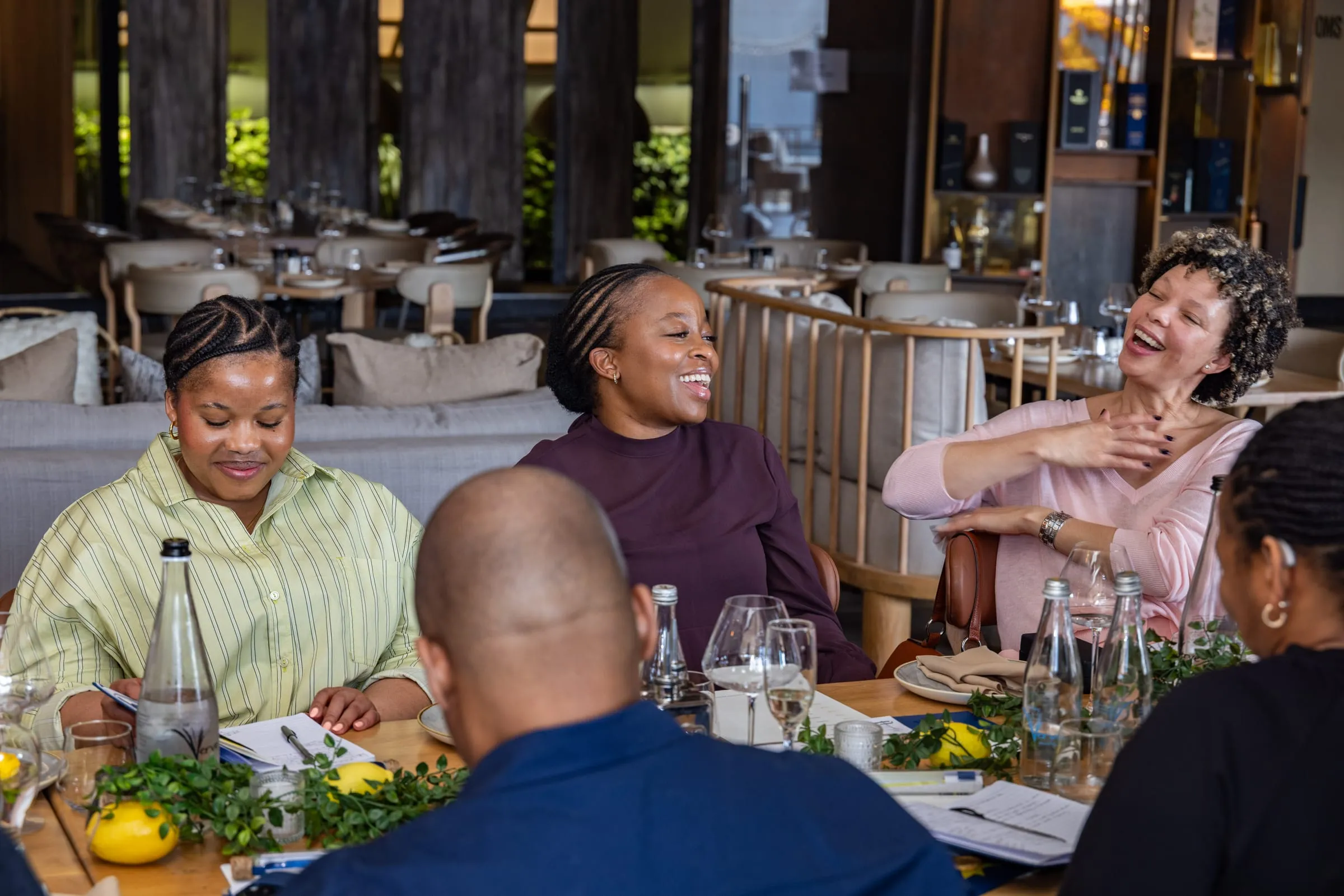 Laughter at one end of the table