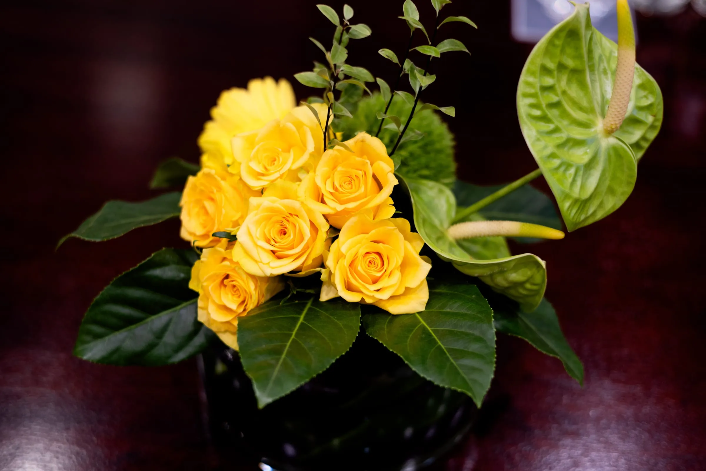 Yellow roses on the boardroom table