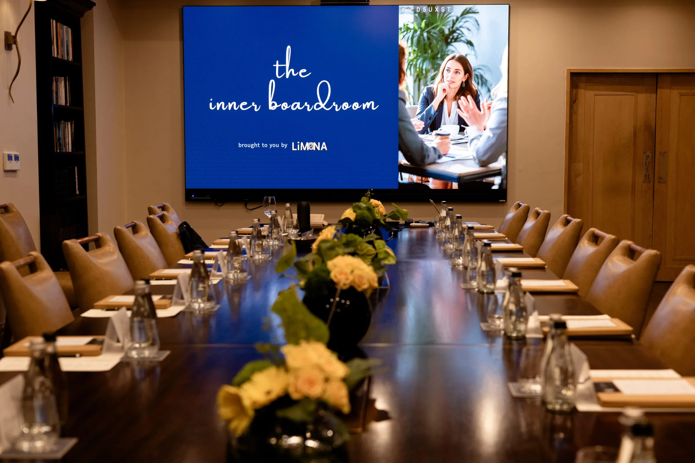 The Inner Boardroom on screen before guests arrive