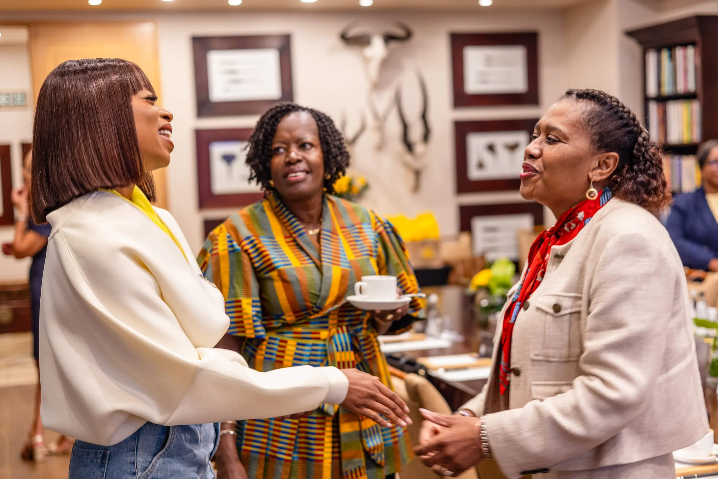 Guests share a laugh before the session