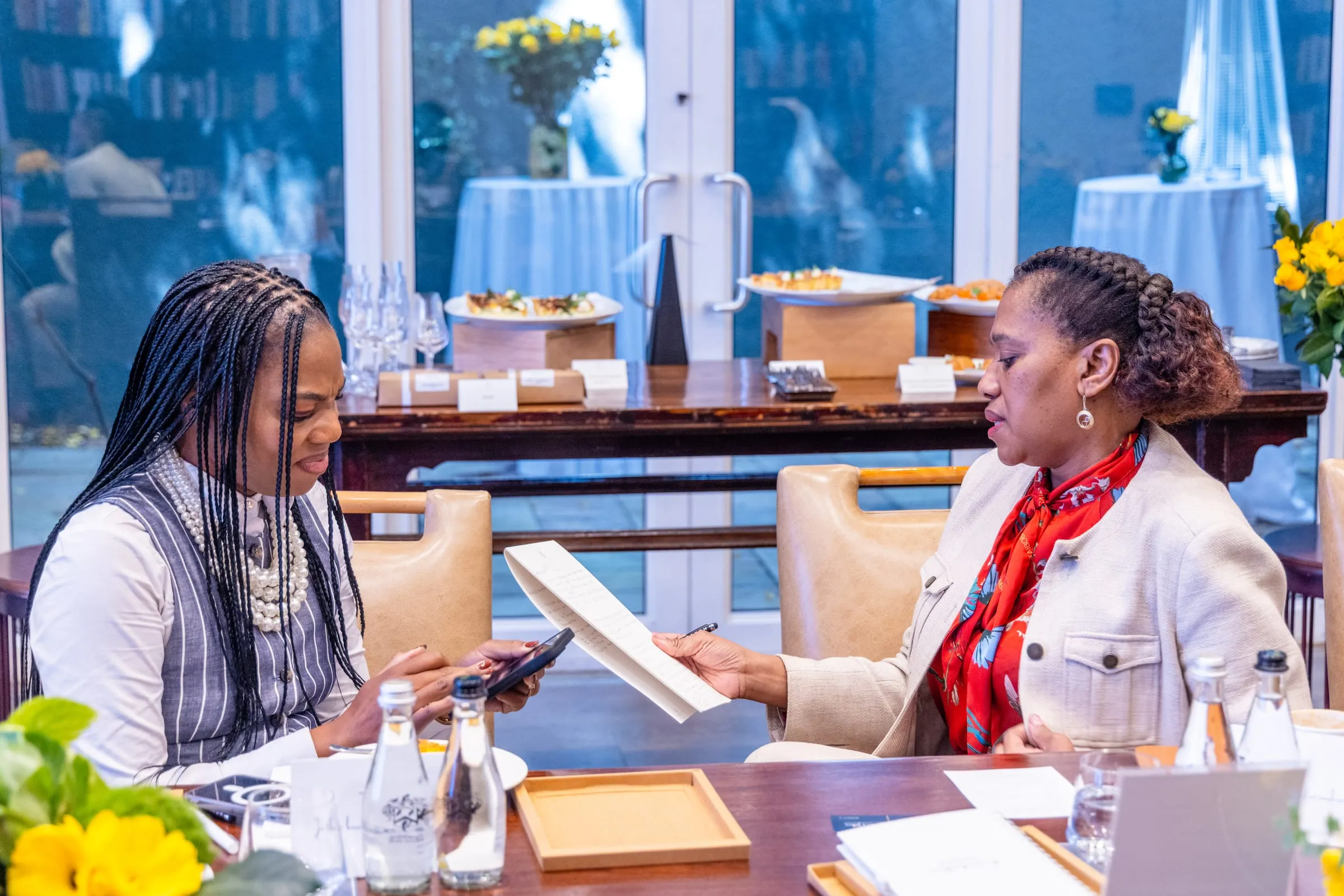 Guests in conversation across the table