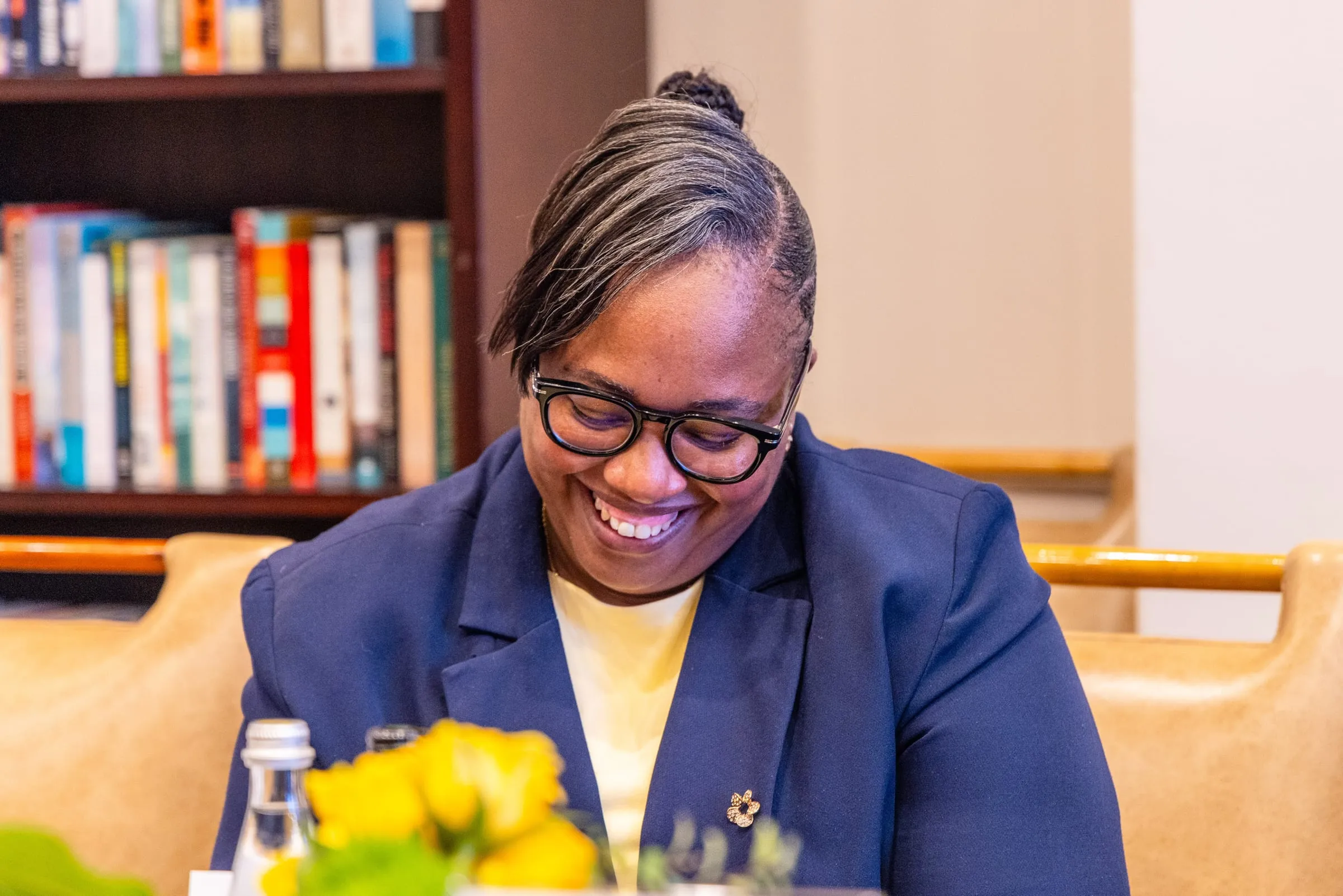 The host smiles during the discussion