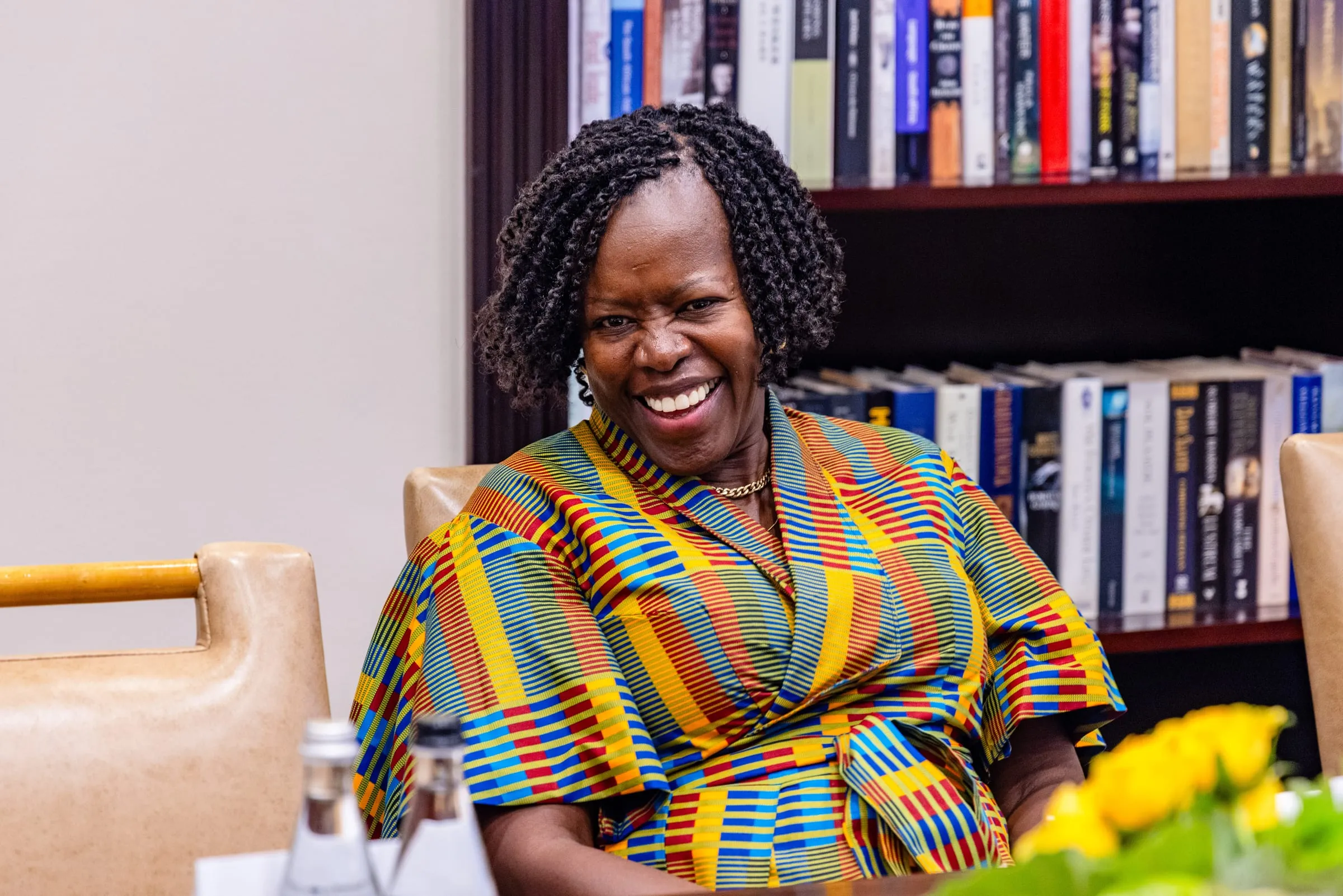 A guest laughs at the table